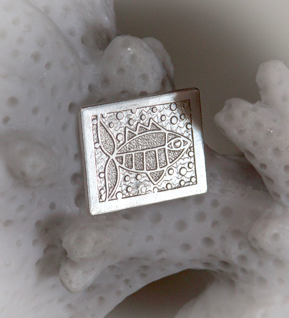 silver handmade golf ball marker slightly rectangular with engraved folk art fish and bubbles