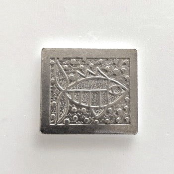 silver handmade golf ball marker slightly rectangular with engraved folk art fish and bubbles
