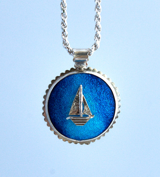 Silver sailboat sailing in the moonlight pendant necklace