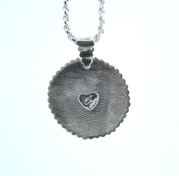 Back side view of handmade pendant