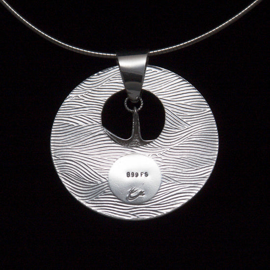 back view of beach handmade enamel pendant necklace set in silver