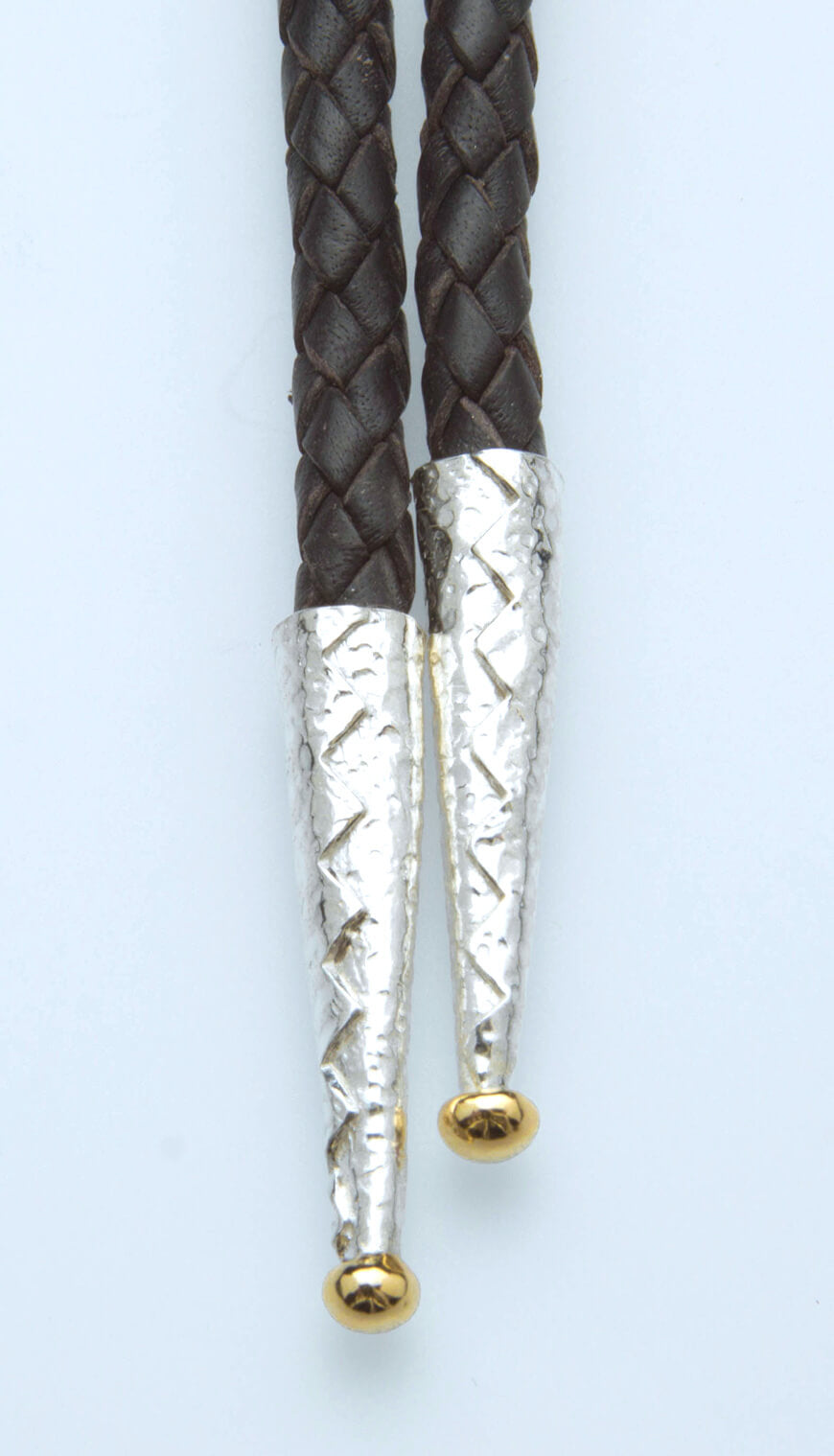 silver and gold aglets for portage lake bolo tie