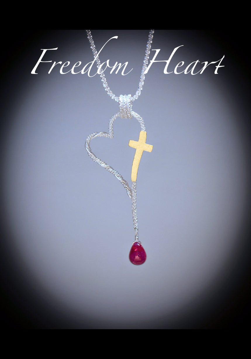 freedom heart pendant necklace of sterling silver, gold and ruby briolette