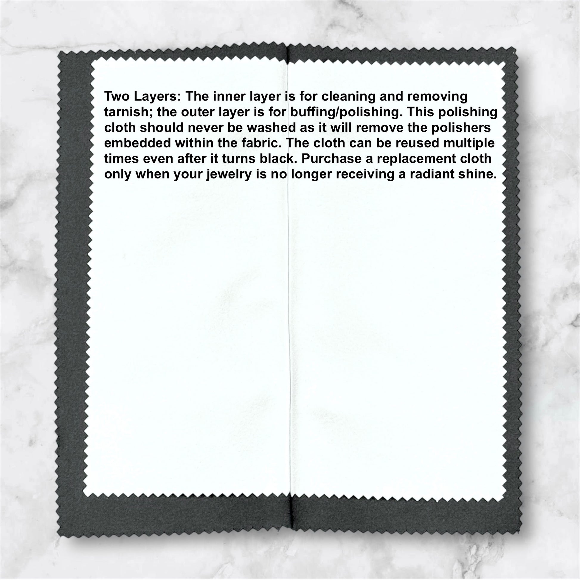 Polishing cloth with text on a marble background