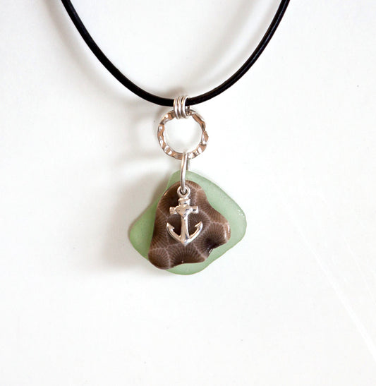 Lake Michigan Petoskey stone and beach glass pendant necklace with sterling silver anchor charm. Hung on black leather cord