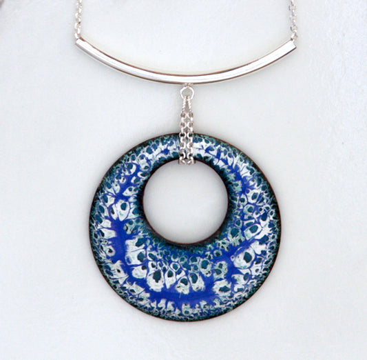 Purple, teal, white and black round enamel pendant with sterling silver tube and chain bail